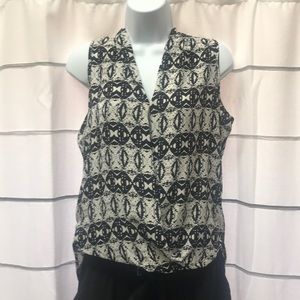 Sleeveless black and white summer blouse